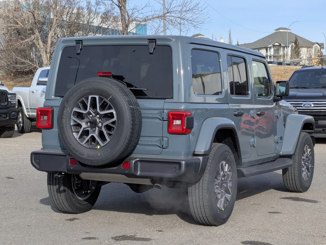 New 2026 Dark blue Jeep Sahara - - 4x4 - McKinley Leather - Body-Color Top - Alpine Audio - Remote Start & More! image 8