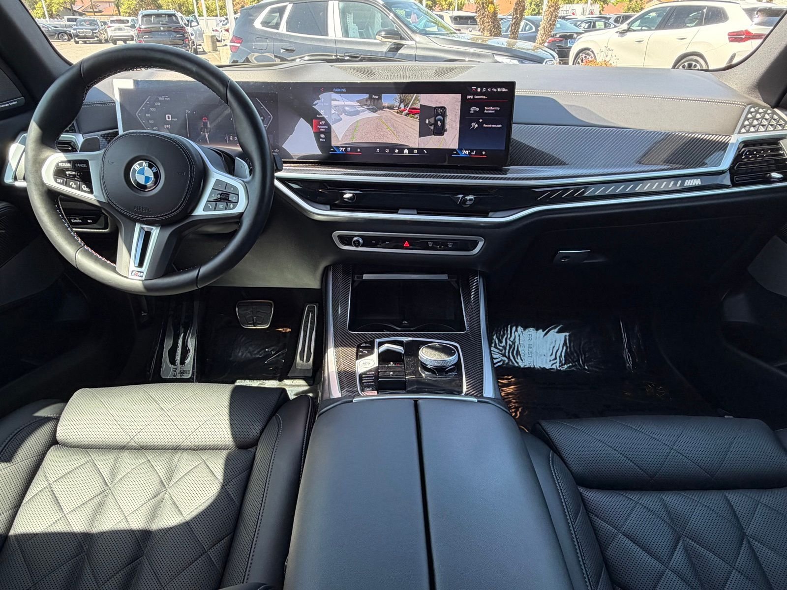 Used 2026 Black Sapphire Metallic BMW M60i image 35