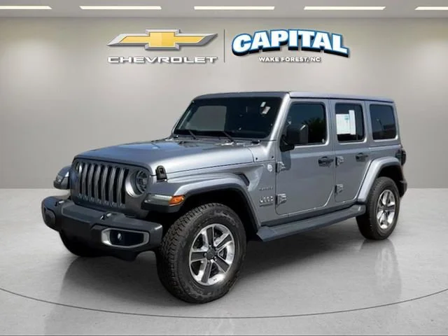 Used 2018 Silver Jeep Sahara 4x4 image 1