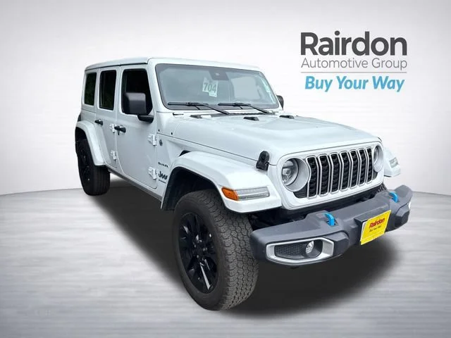 Used 2024 Bright White Clearcoat Jeep Sahara 4xe image 1