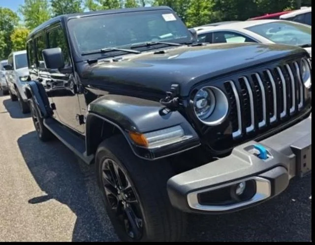 Used 2023 Black Jeep Sahara 4xe image 1
