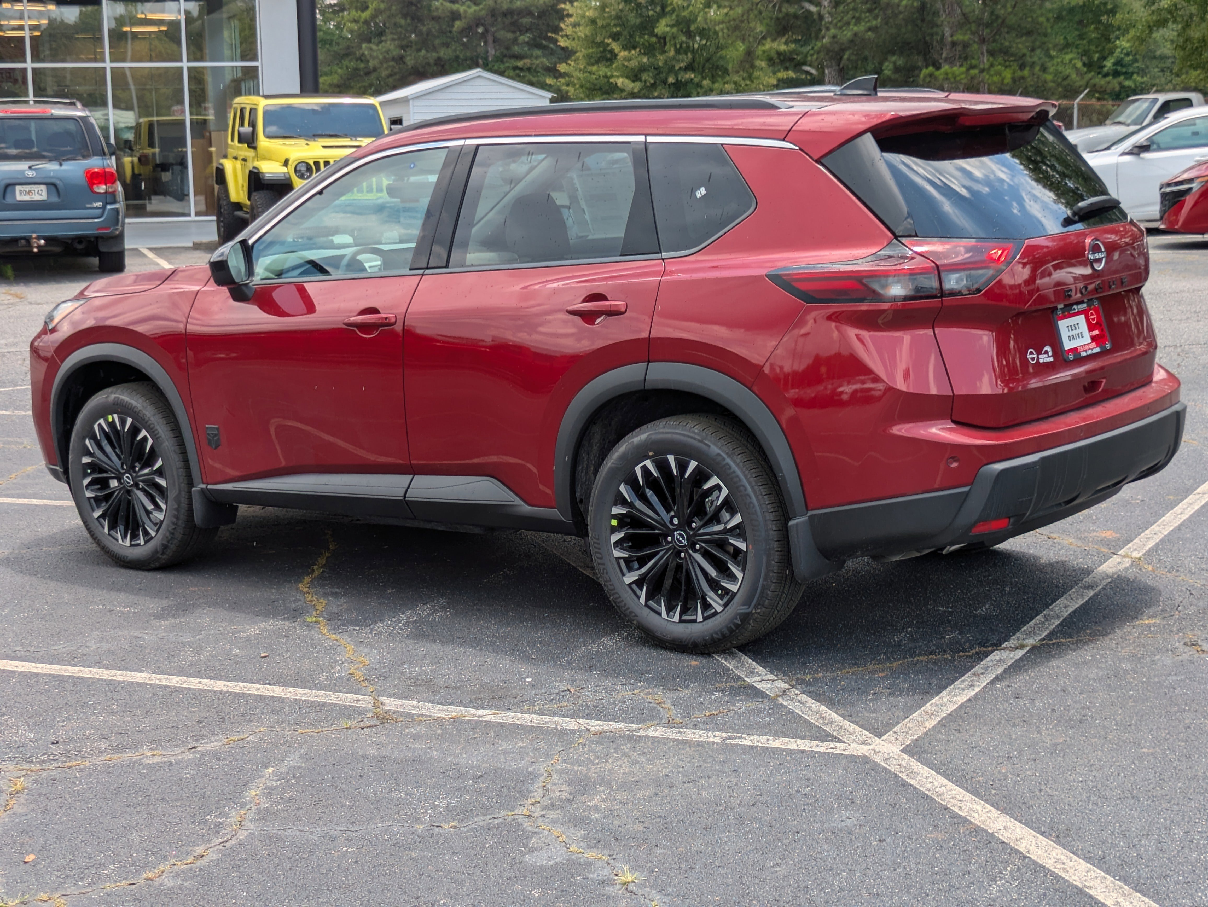 New 2026 Red Nissan Dark Armor image 3