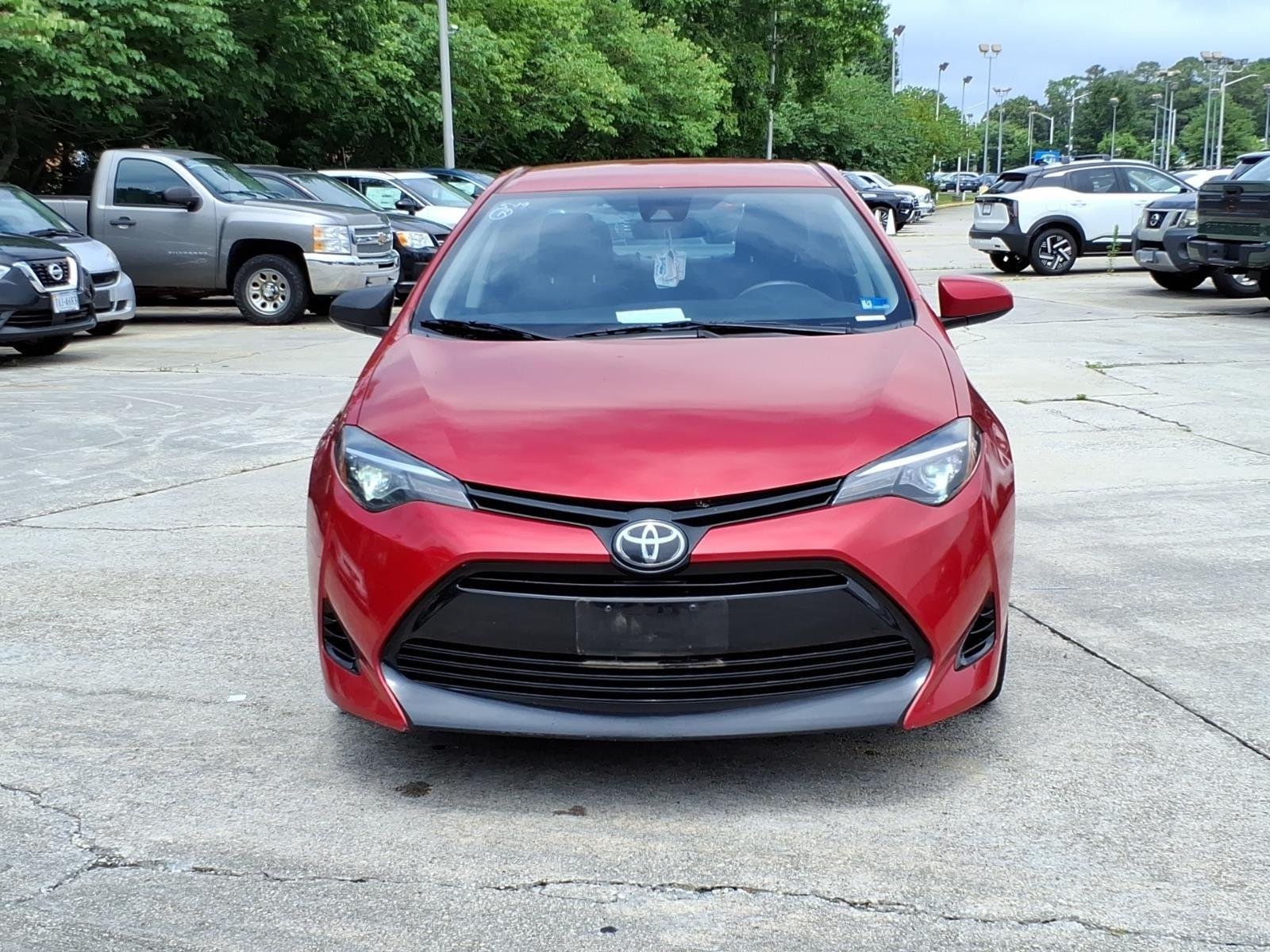 Used 2018 Barcelona Red Metallic Toyota LE image 2