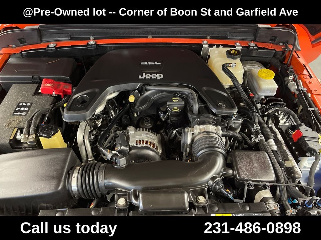 Used 2018 Orange Jeep Unlimited Sahara image 4