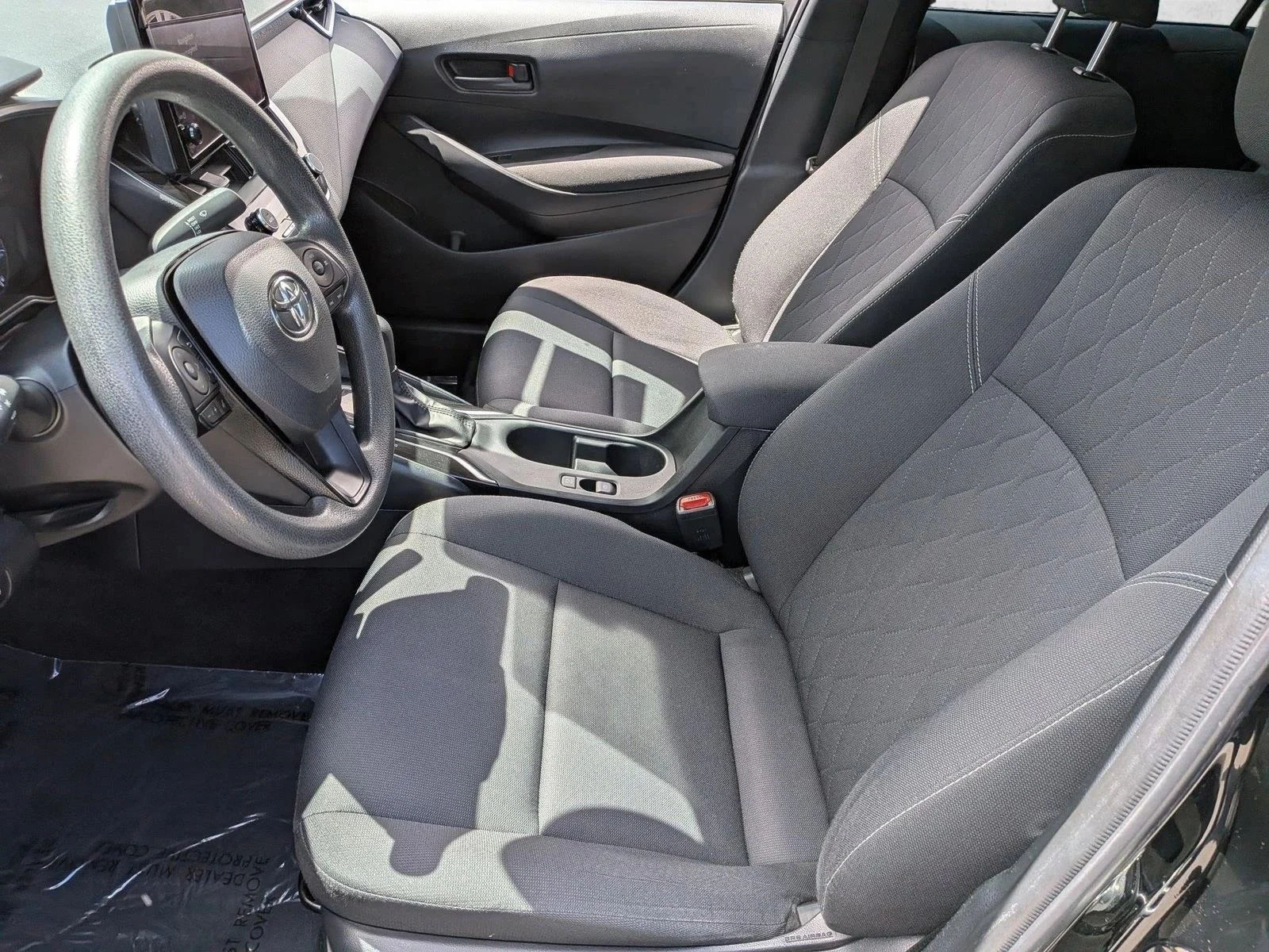 Used 2024 Midnight Black Metallic Toyota Hybrid LE image 16