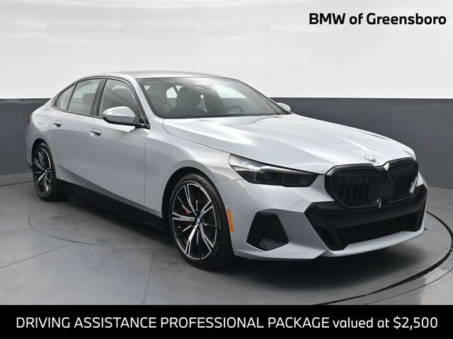 Used 2026 Gray BMW 550e xDrive image 1