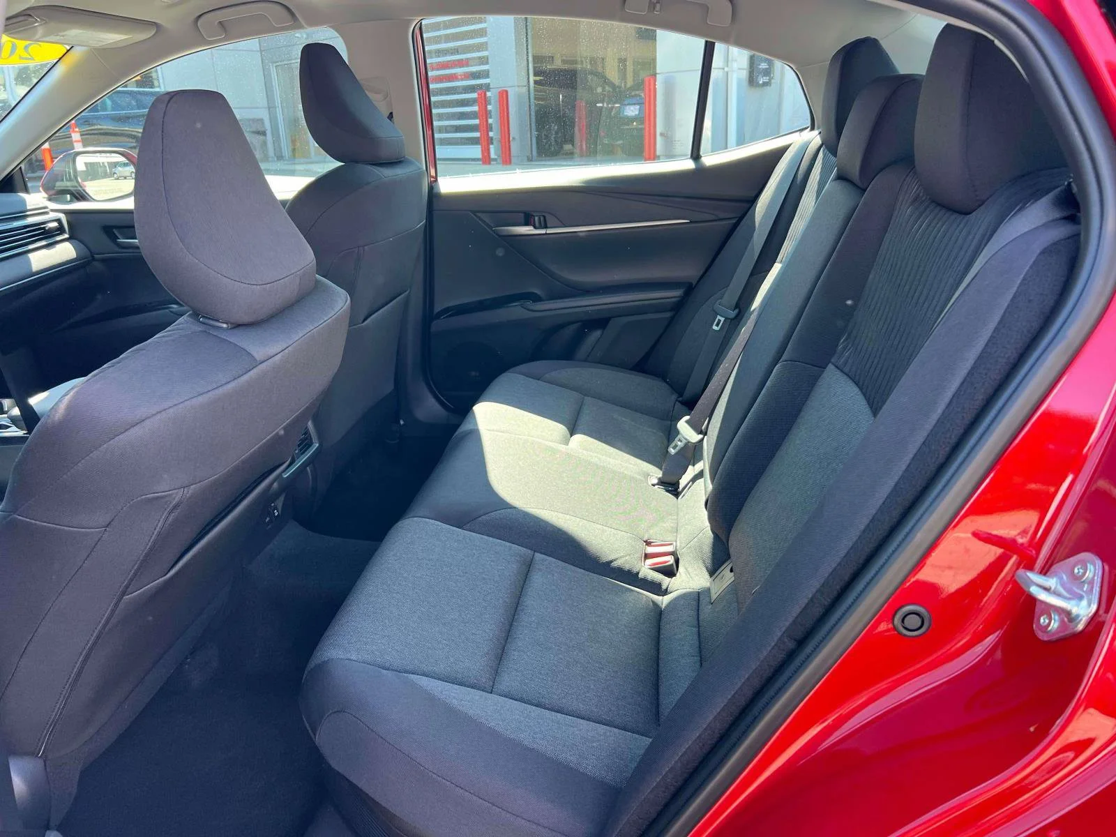 Used 2025 SUPERSONIC RED Toyota LE image 12