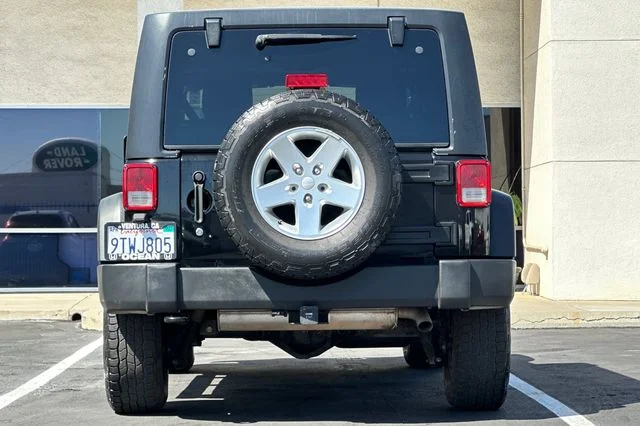 Used 2015 Black Clearcoat Jeep Unlimited Sport image 5