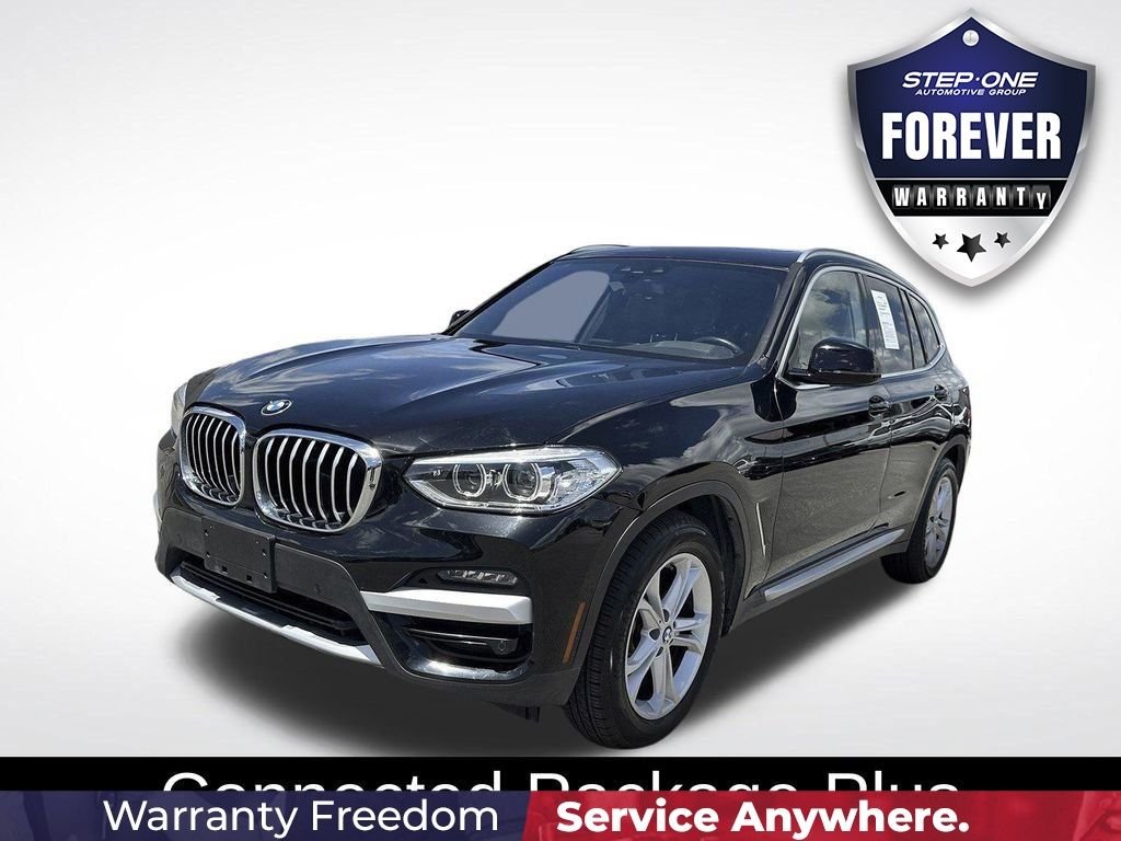 Used 2021 Black BMW sDrive30i image 2