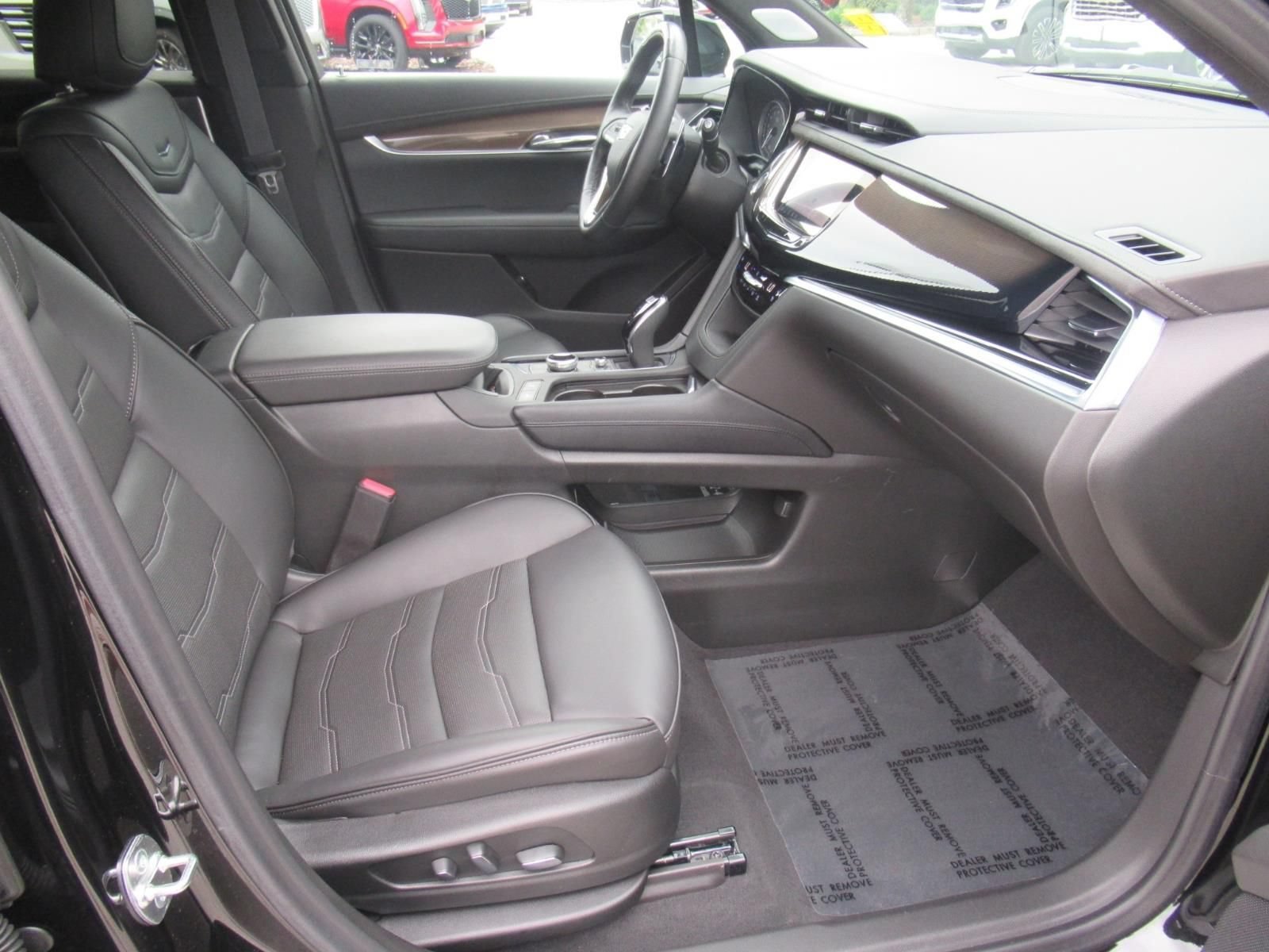 Certified Used 2025 Stellar Black Metallic Cadillac Sport image 11
