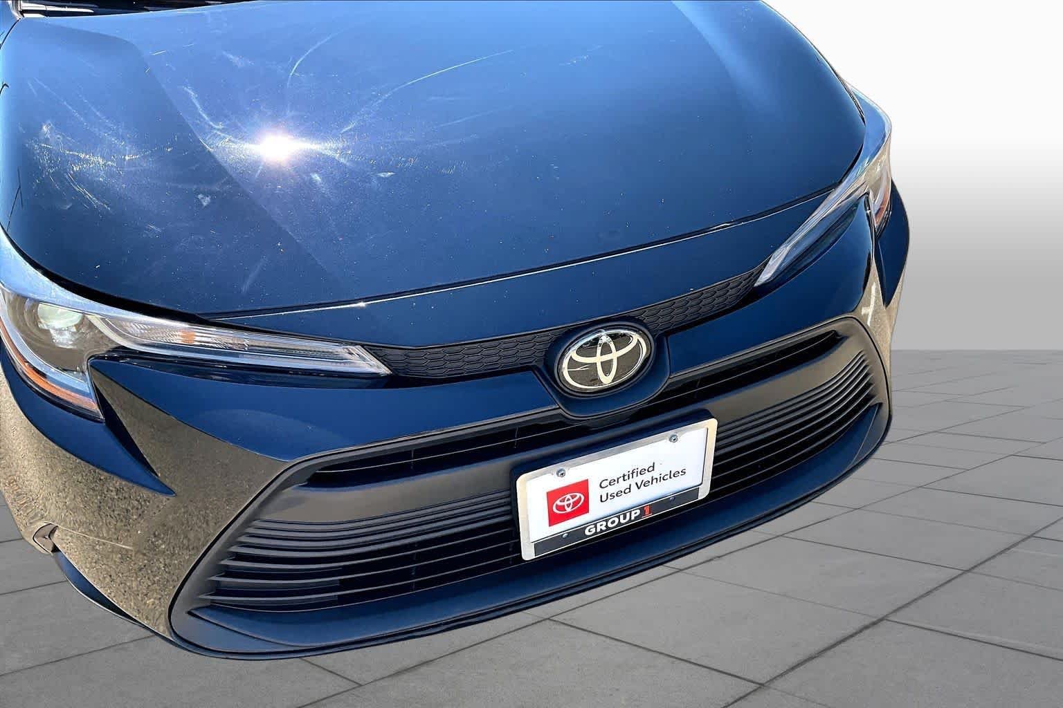 Used 2023 Midnight Black Metallic Toyota LE image 29