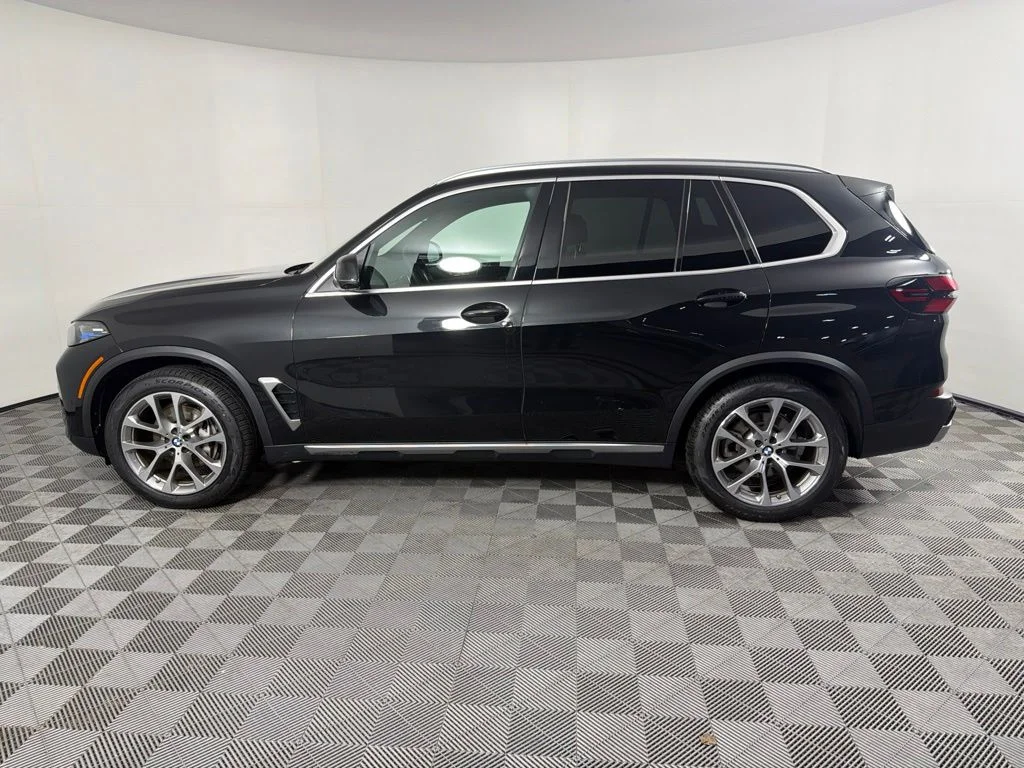 Certified Used 2024 Black Sapphire Metallic BMW xDrive40i image 8