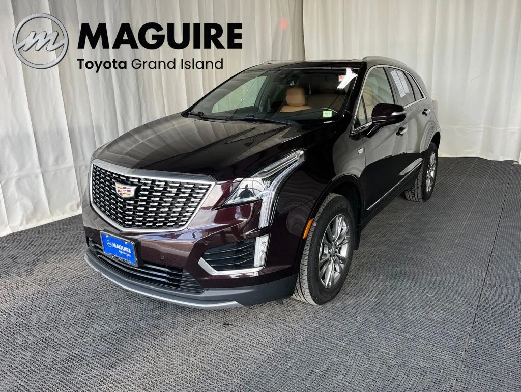 Used 2021 Red Cadillac Premium Luxury image 1