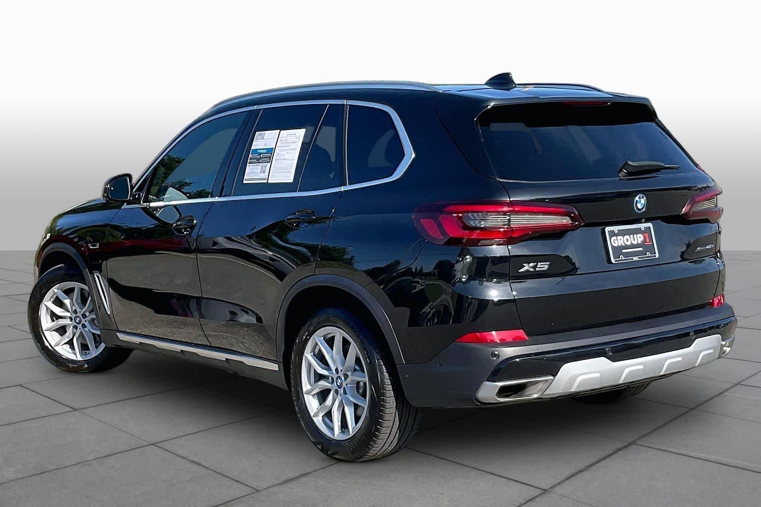 Used 2023 Black Sapphire Metallic BMW xDrive45e image 11