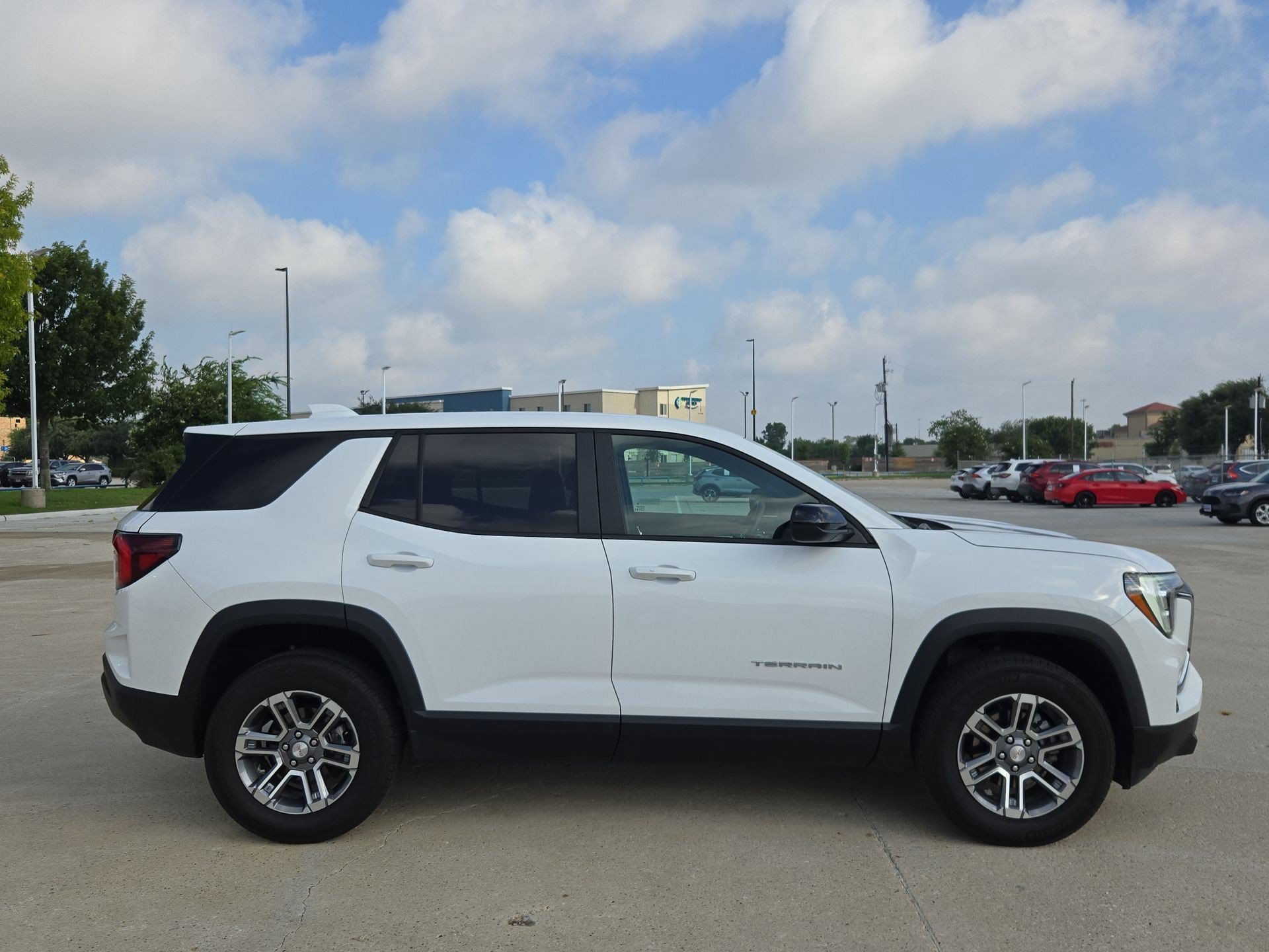 Used 2026 Summit White GMC FWD Elevation image 2
