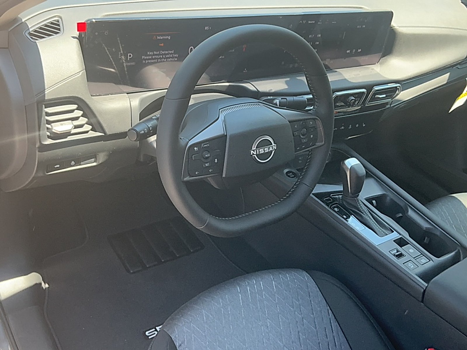 New 2026 Gun Metallic Nissan SV image 7