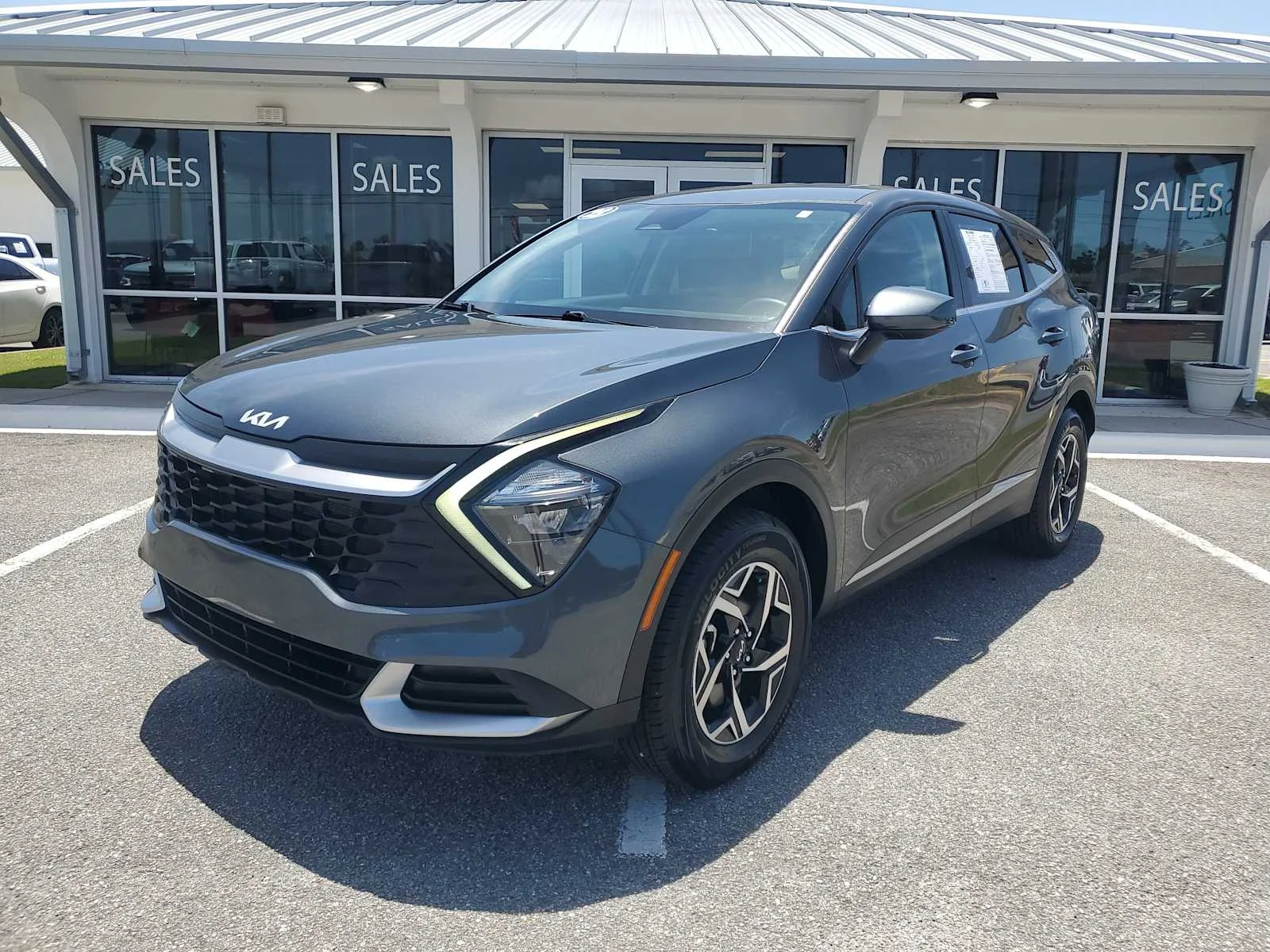 Used 2023 Gray Kia LX image 1