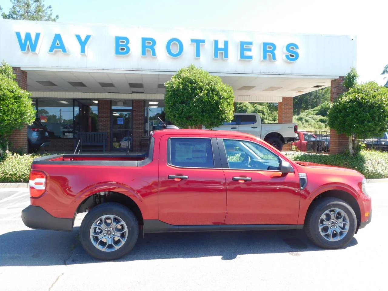 New 2026 Ruby Red Metallic Tinted Clearcoat Ford XLT image 1