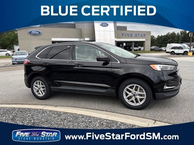 Certified Used 2022 Agate Black Metallic Ford SEL image 1