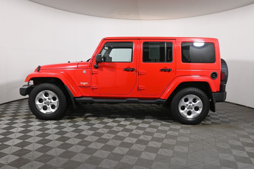 Used 2015 Jeep Wrangler Unlimited Sahara with VIN 1C4BJWEG9FL565059 for sale in Warwick, RI