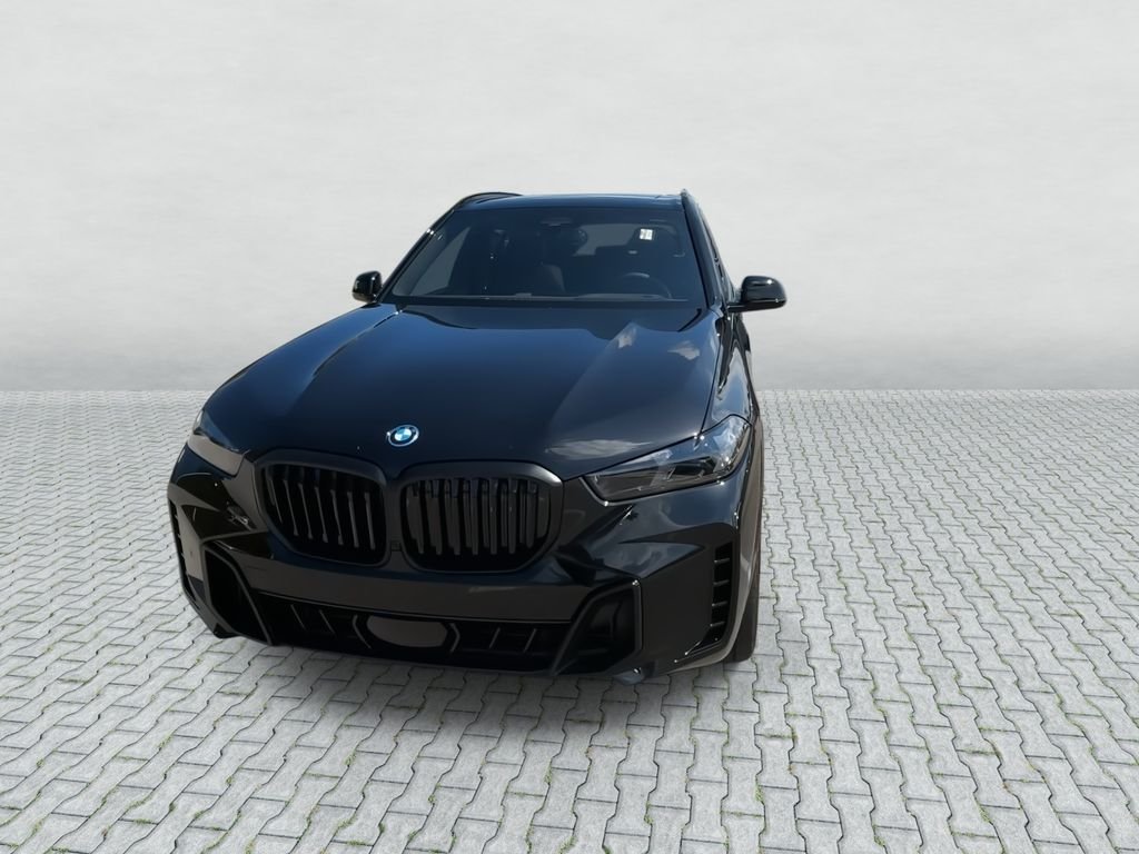 New 2026 Black Sapphire Metallic BMW xDrive50e image 4