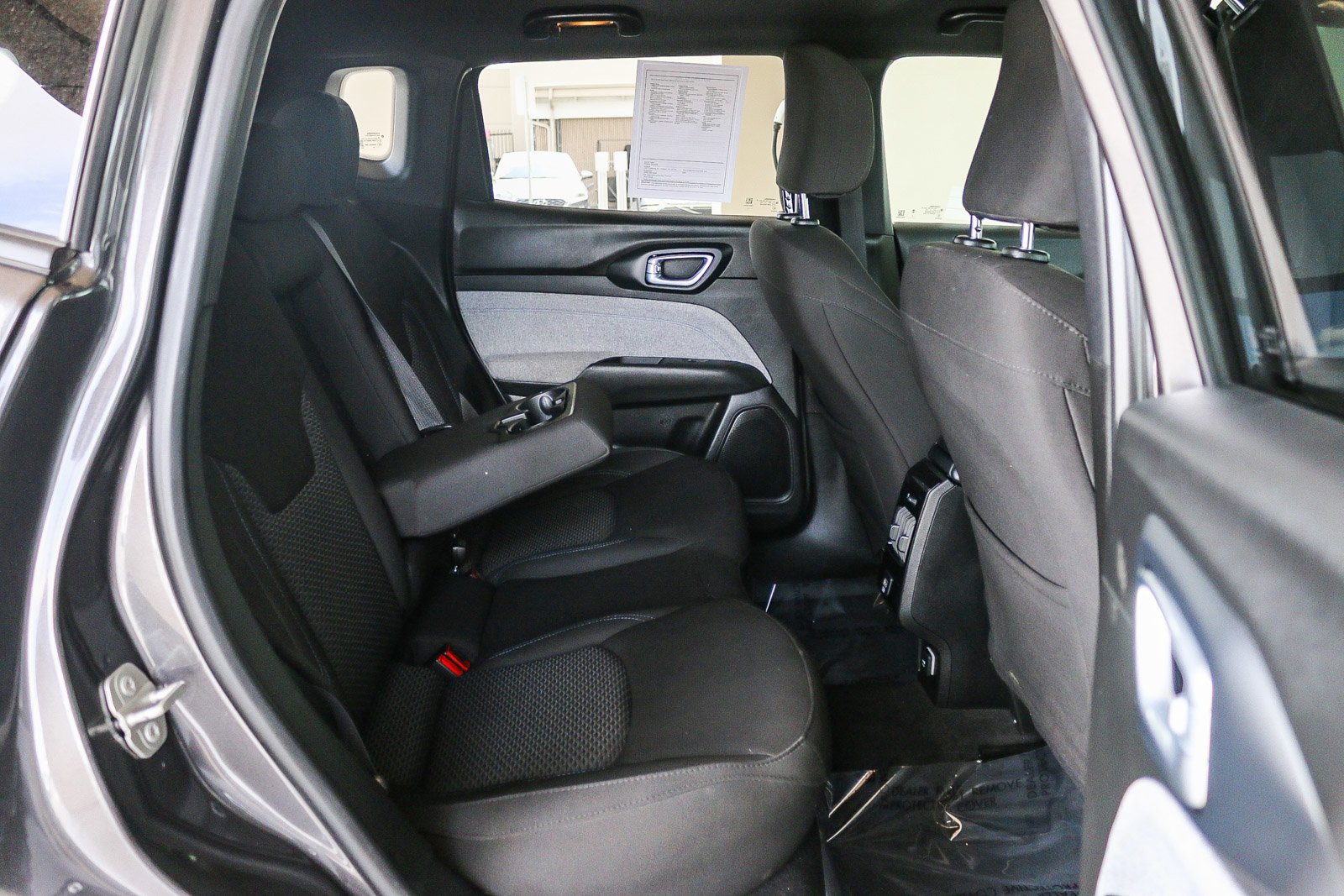 Used 2023 Granite Crystal Metallic Clearcoat Jeep Sport image 17