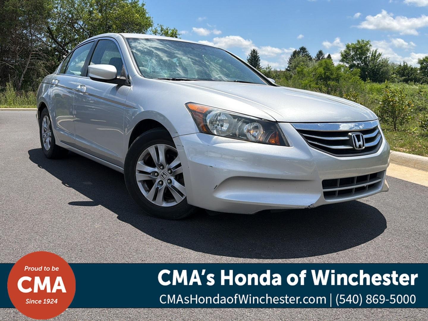 Used 2012 Alabaster Silver Metallic Honda LX Premium image 1