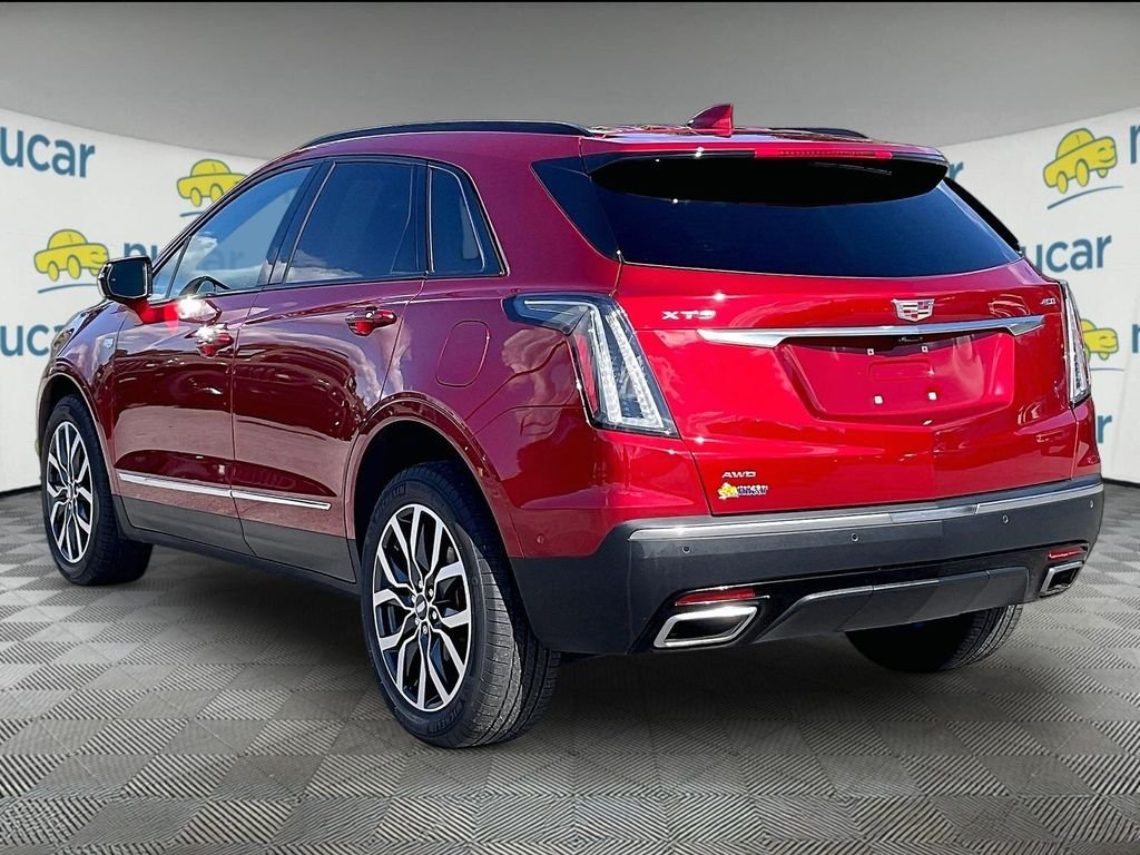 Used 2024 Radiant Red Tintcoat Cadillac Sport image 4