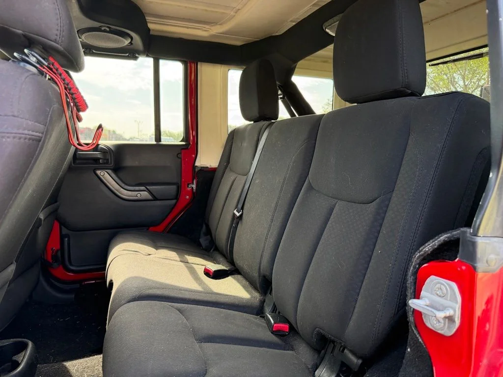 Used 2014 Red Jeep Unlimited Sport image 22