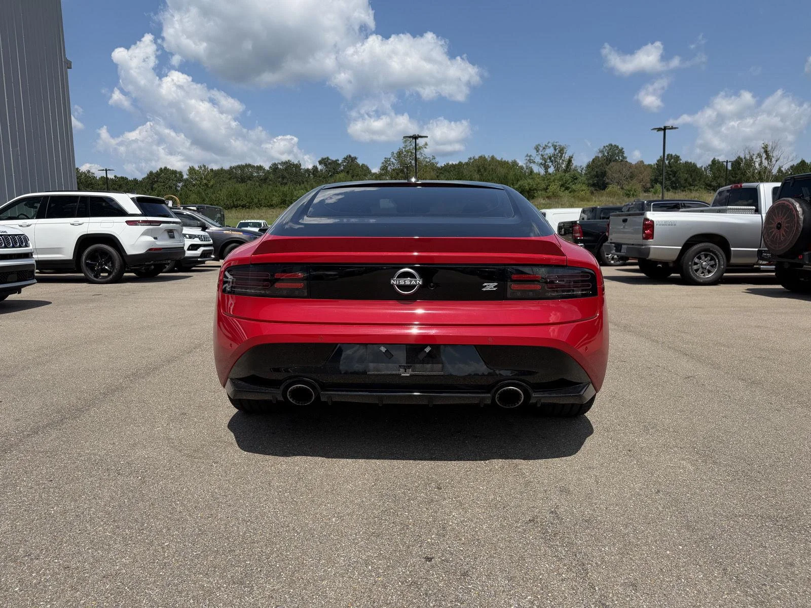 Used 2025 Solid Red/Super Black Nissan Performance image 5