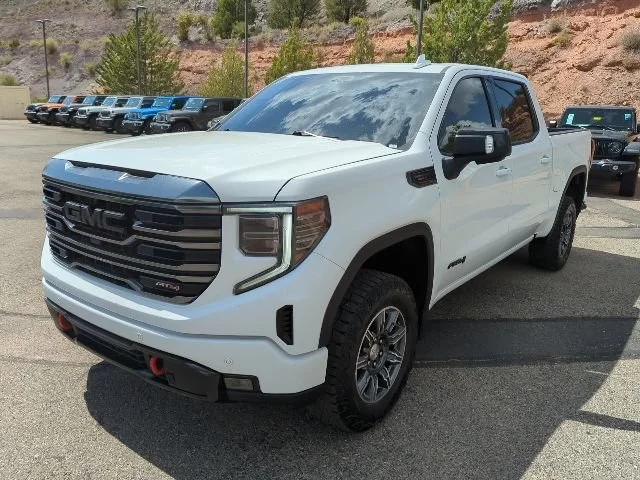 Used 2024 Summit White GMC AT4 image 1