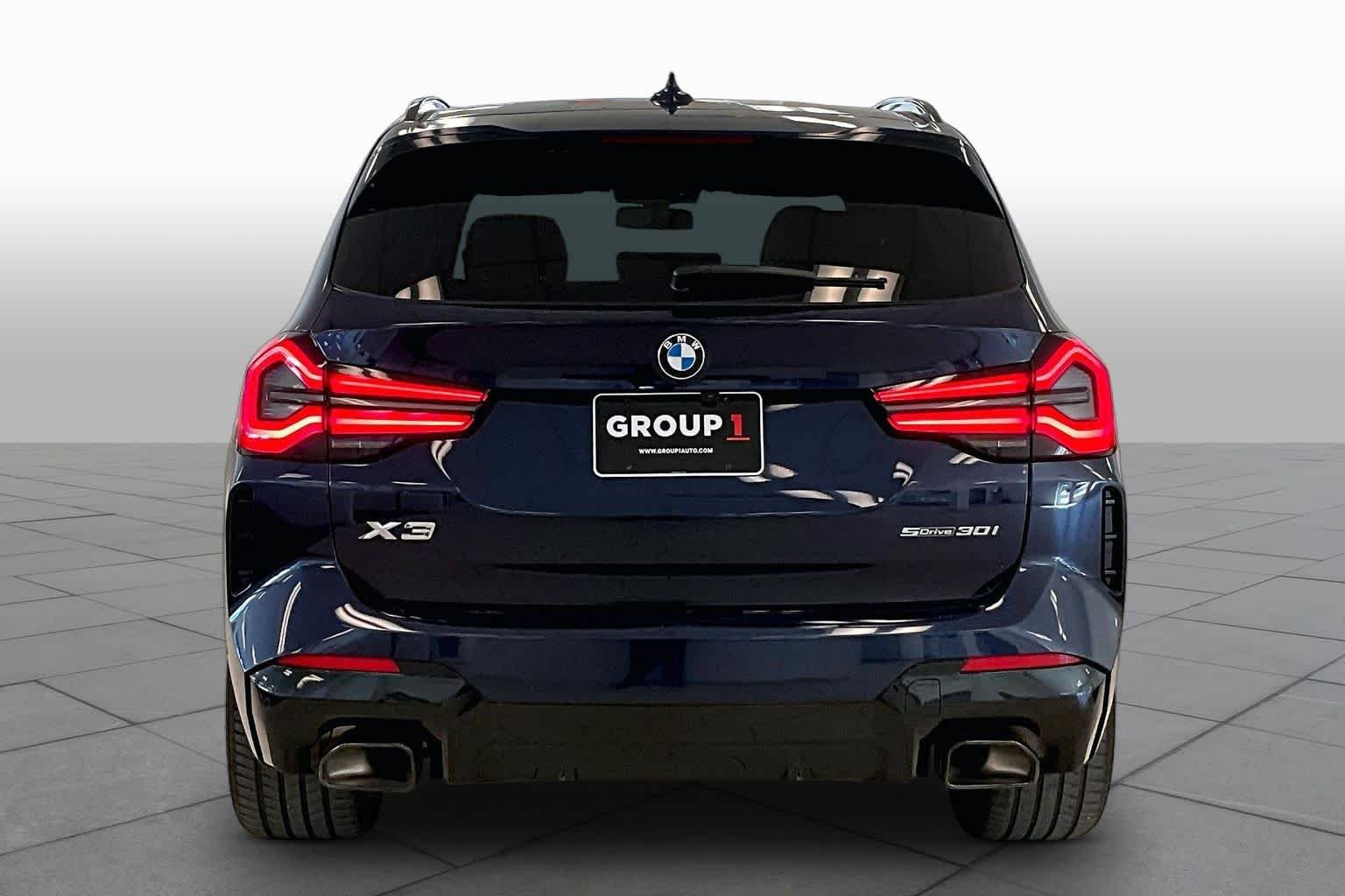 Used 2024 Tanzanite Blue II Metallic BMW sDrive30i image 4