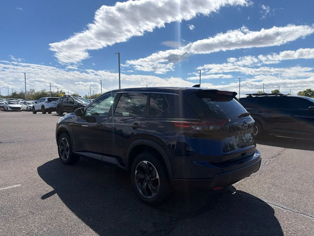 Used 2024 Deep Ocean Blue Pearl Nissan SV image 6