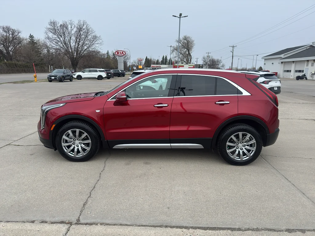 Used 2023 Radiant Red Tintcoat Cadillac AWD Premium Luxury image 1