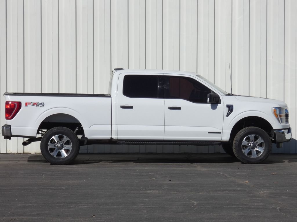 Used 2021 Ford F-150 XLT with VIN 1FTFW1E13MFC73601 for sale in Kansas City
