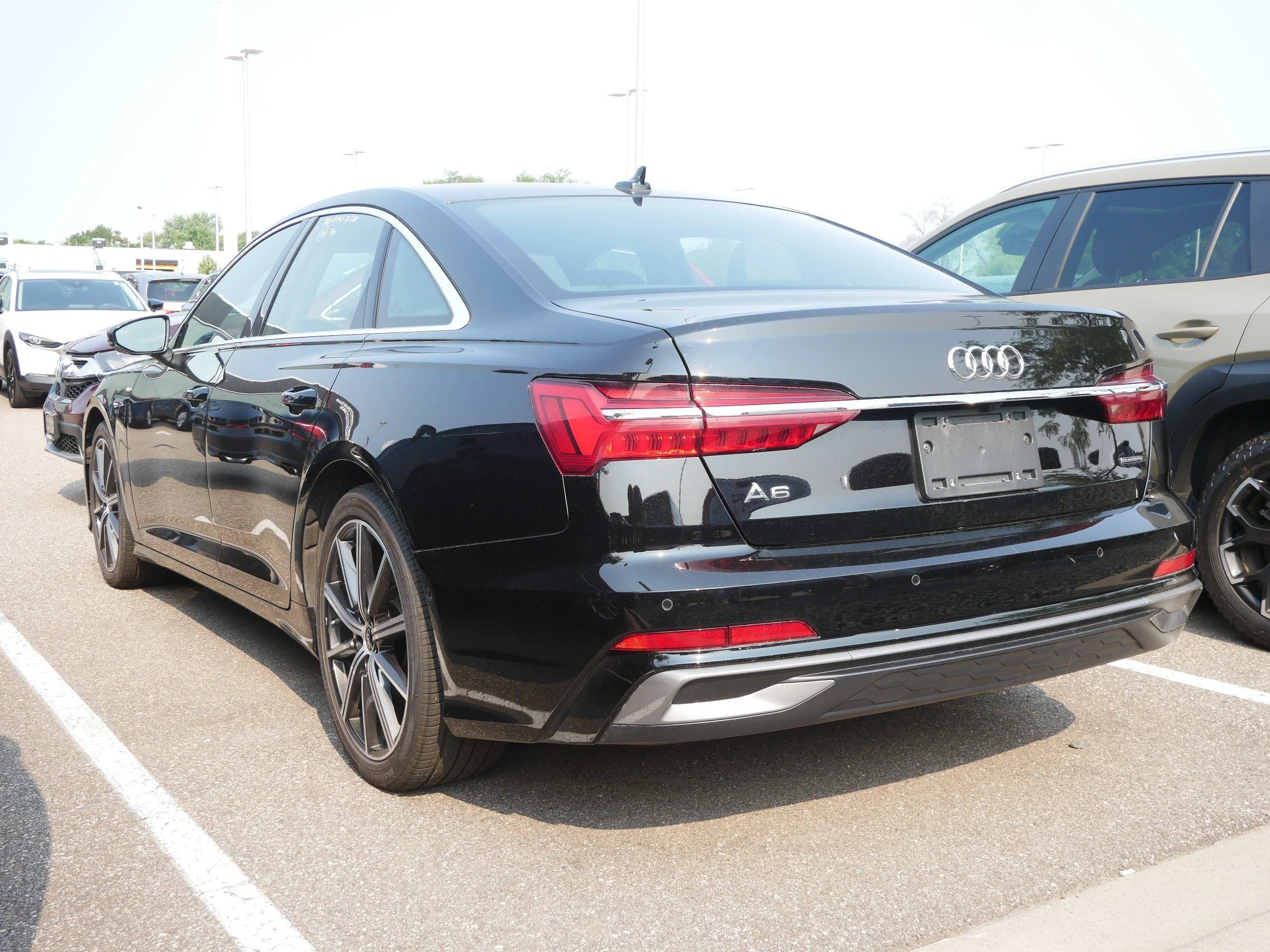 Used 2024 Mythos Black Metallic Audi Premium Plus image 4