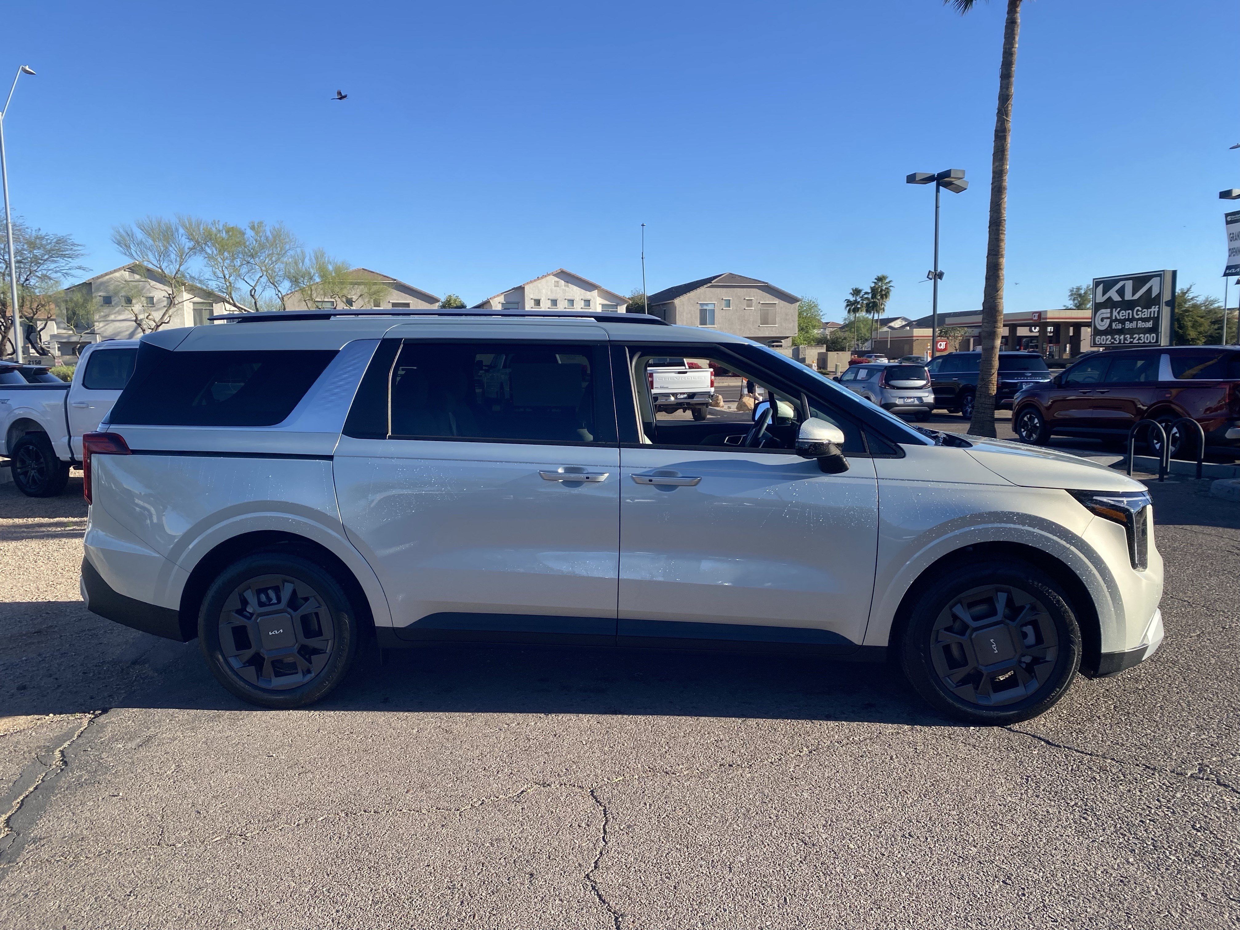 New 2026 Ivory Silver Kia EX image 2