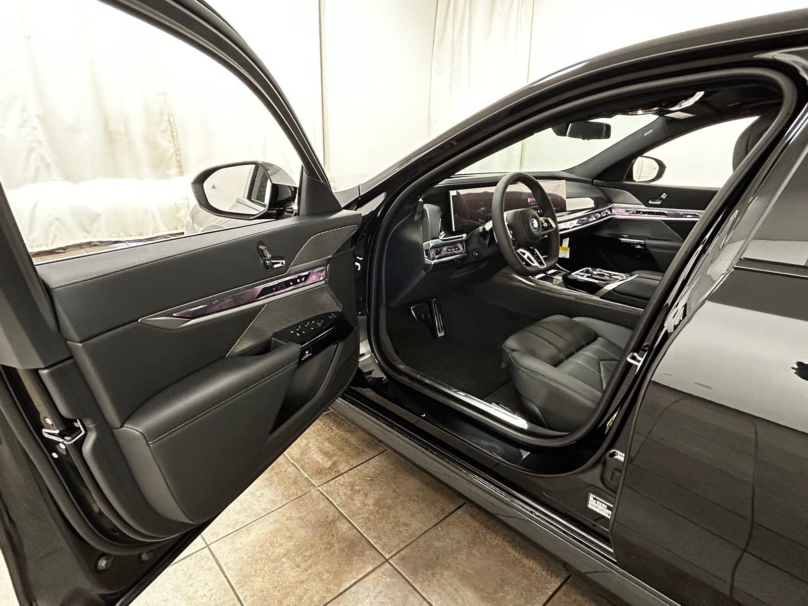 New 2026 Black Sapphire Metallic BMW xDrive60 image 38