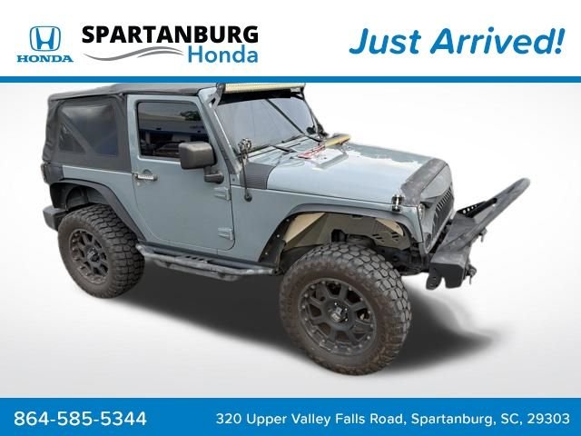 Used 2014 Gray Jeep Sport image 1