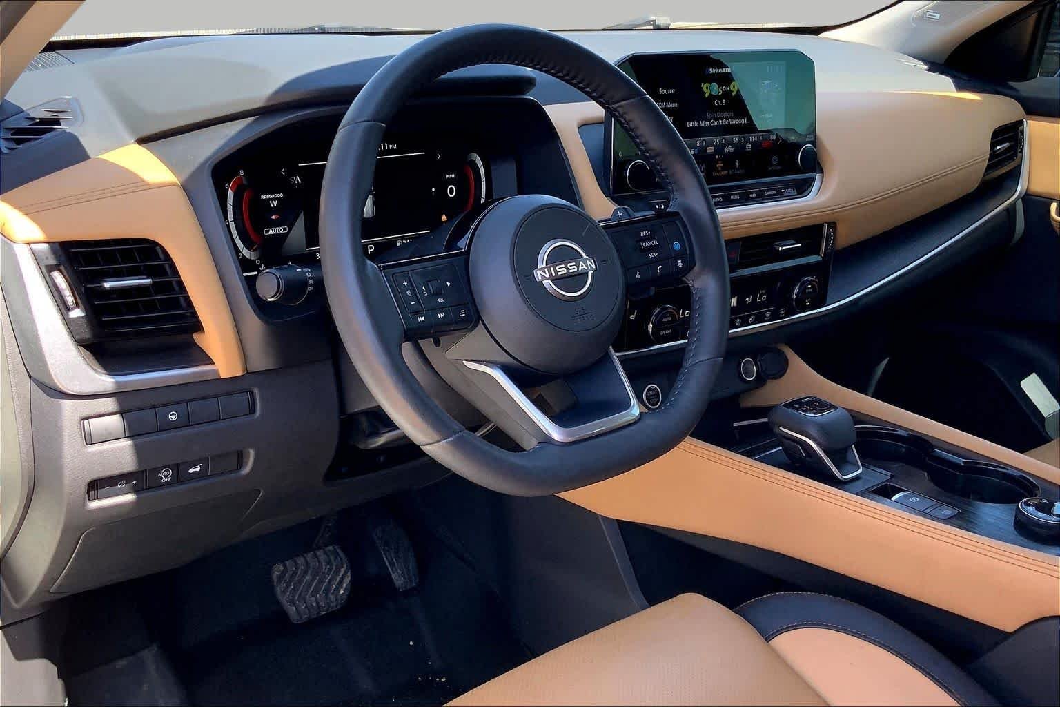 Used 2023 Pearl White Tricoat/Super Black Nissan Platinum image 18