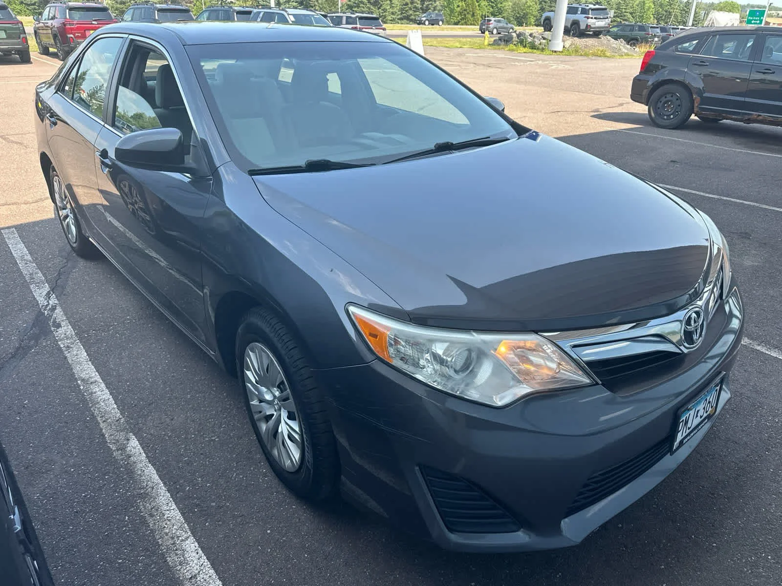 Used 2014 Magnetic Gray Metallic Toyota LE image 2
