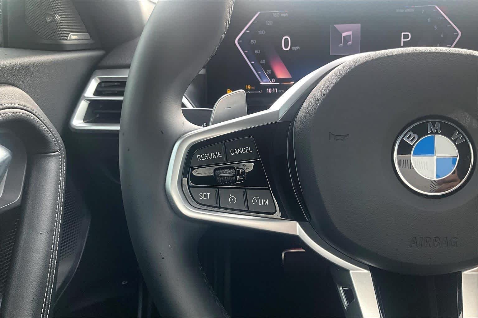 Used 2025 Black Sapphire Metallic BMW 230i xDrive image 21