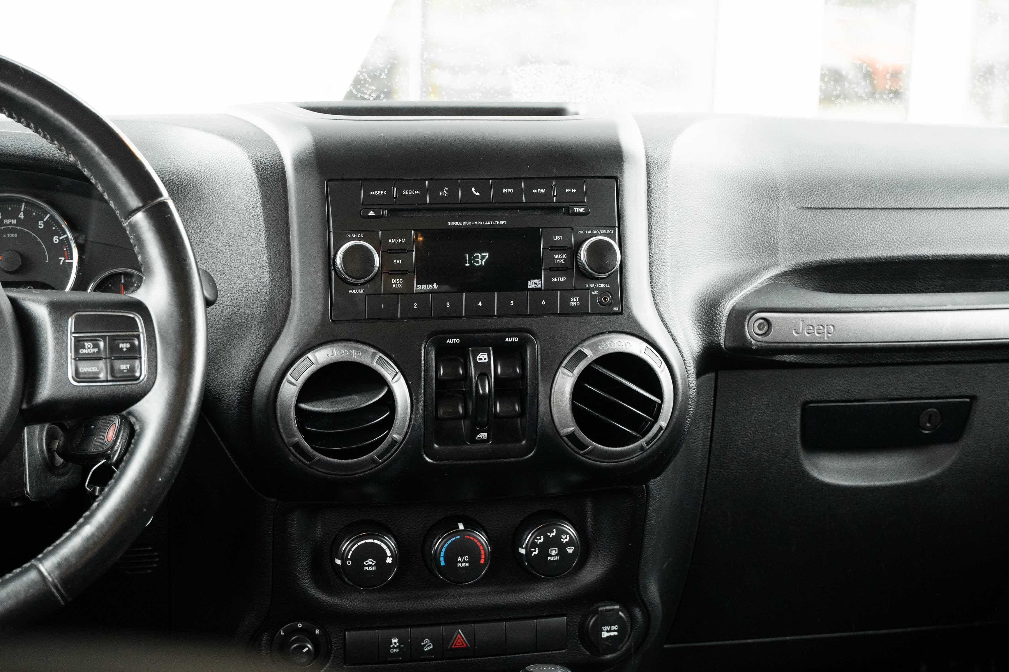 Used 2017 Black Clearcoat Jeep Sport image 10