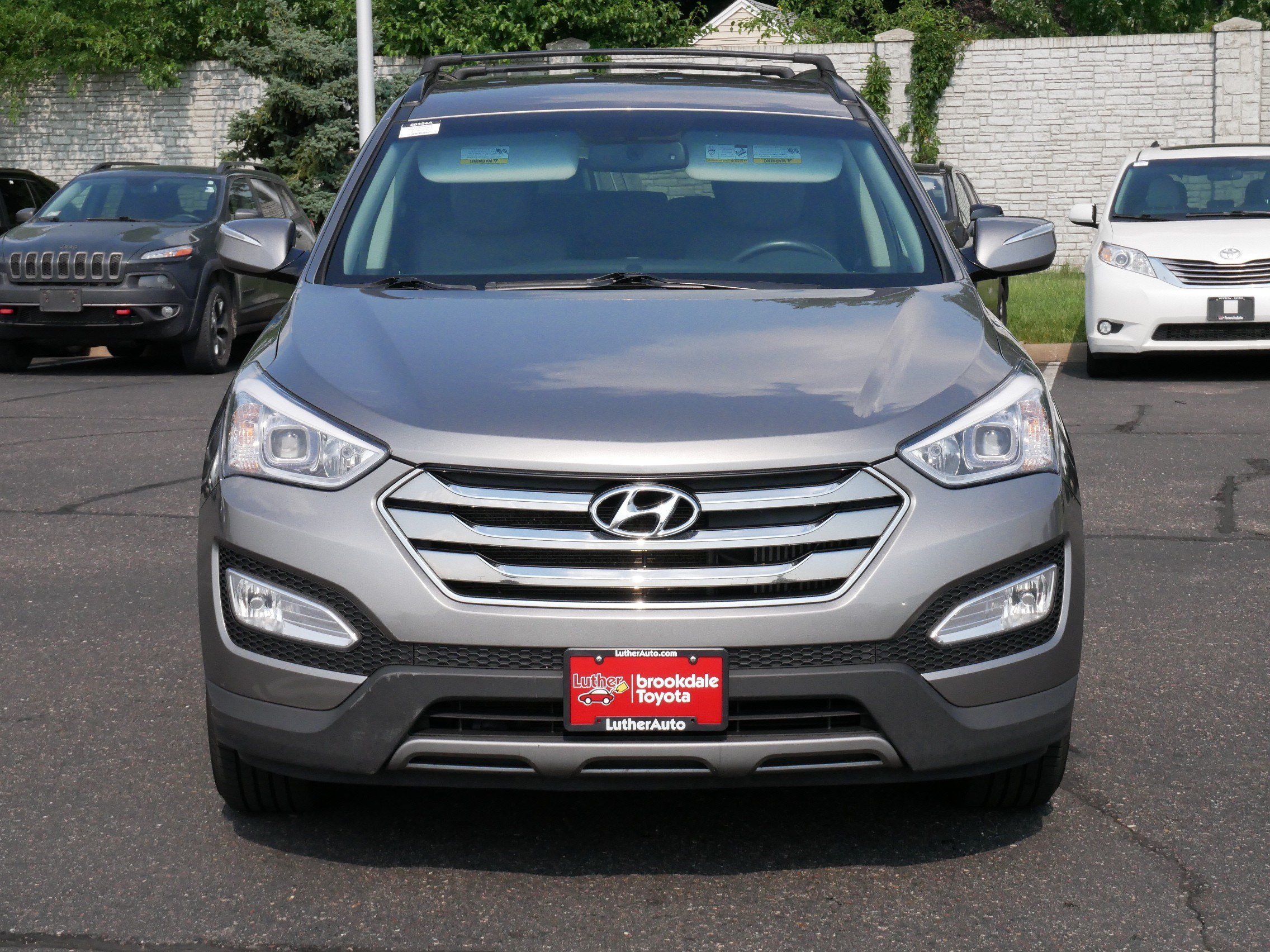 Used 2013 Hyundai Santa Fe Sport 2.0T with VIN 5XYZUDLAXDG087848 for sale in Brooklyn Center, Minnesota