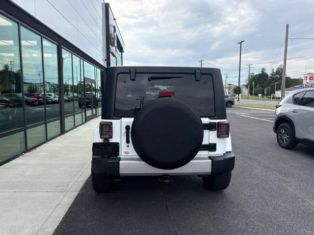Used 2017 White Jeep Unlimited Sahara image 4