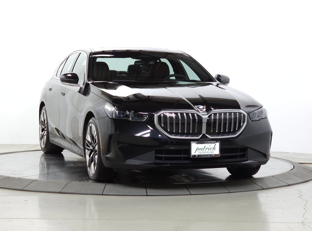 Used 2024 Black Sapphire Metallic BMW 540i xDrive image 1