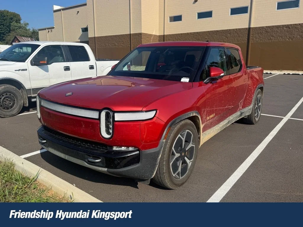 Used 2022 Red Rivian Adventure image 1