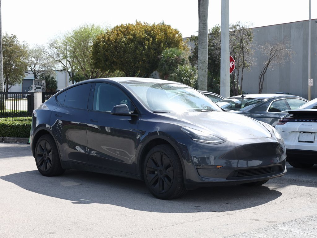 Used 2025 Tesla Model Y Long Range with VIN 7SAYGDED9SA377898 for sale in Doral, FL