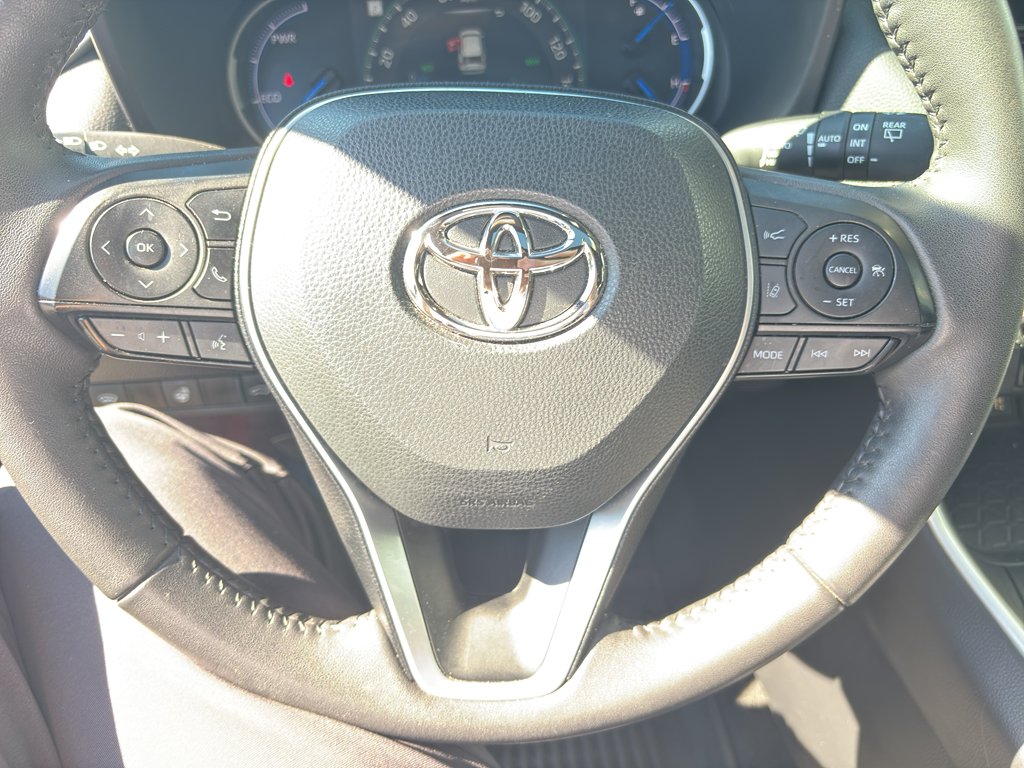 Used 2024 Cavalry Blue/Midnight Black Metallic Toyota Hybrid XSE image 8