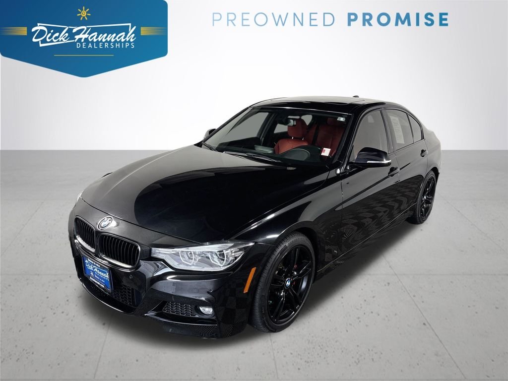 Used 2016 Black BMW 328i image 1